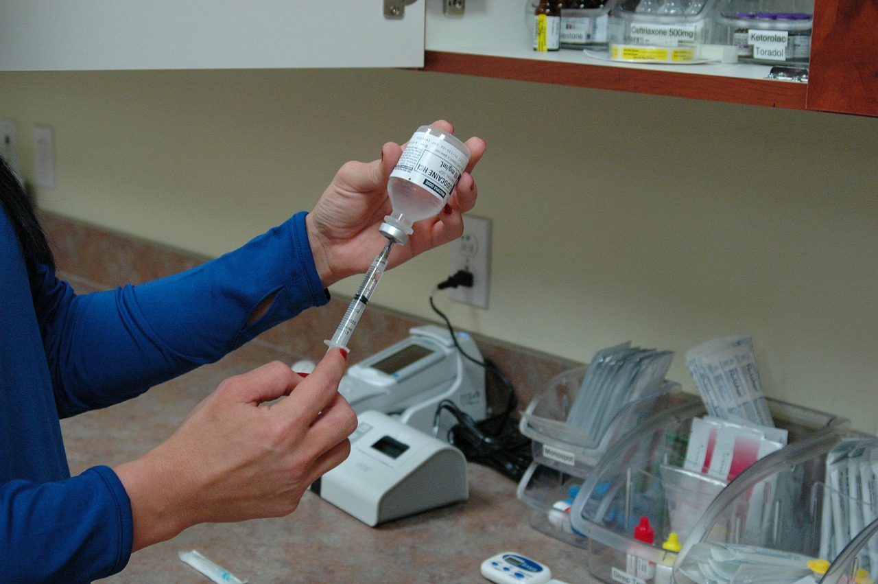 Photo of nurse filling syringe