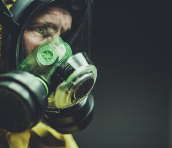 photo of man wearing respirator mask against covid 19